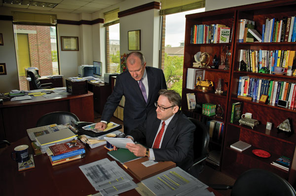 Dean Ira Solomon, seated, with Senior Associate Dean Paul Spindt. Dean Solomon says the Freeman School's emphasis on generating a virtuous cycle is unique among business school strategic plans.