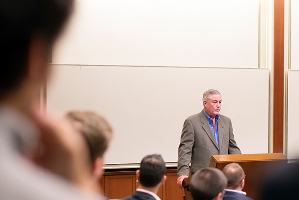 Investor Dewey Corley, left, spoke about his friend Aaron Selber and his approach to distressed debt as the course's first guest lecturer.